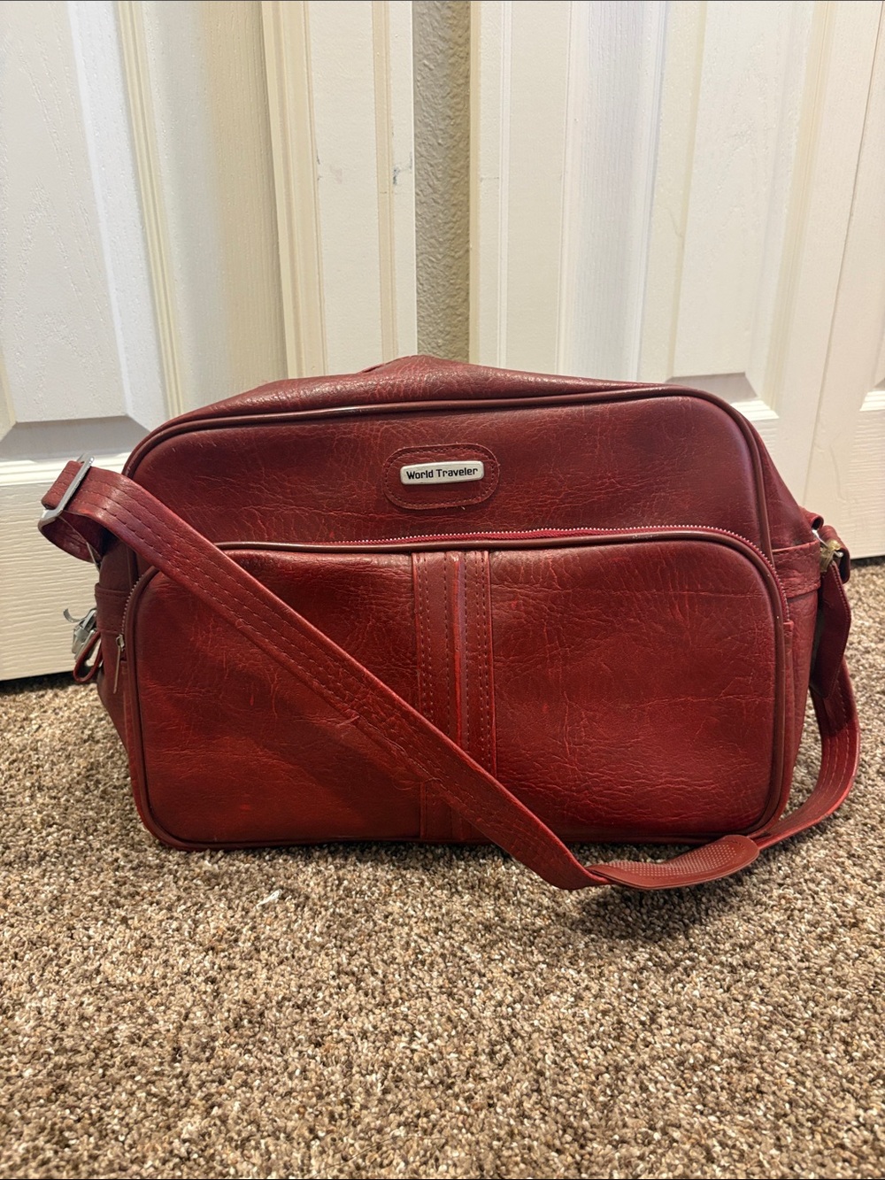 World Traveler Red Leather Crossbody Travel Bag